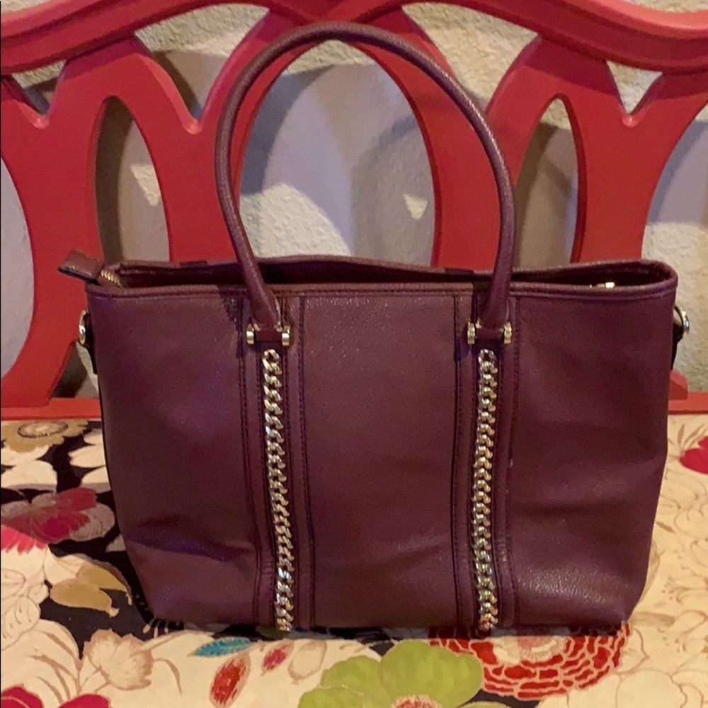 Burgundy purse with gold braided accent
